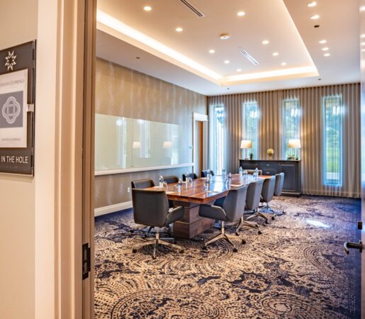 meeting room with long table and chairs