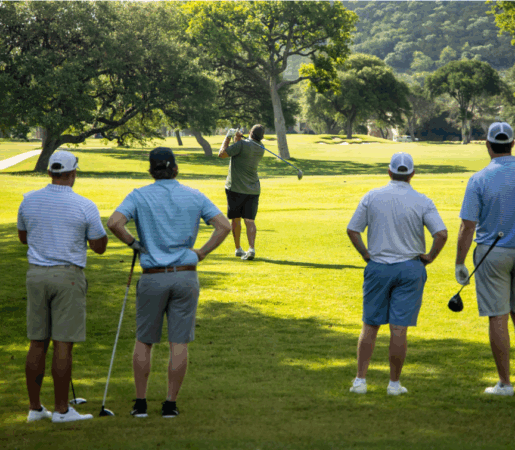 Group of people playing golf