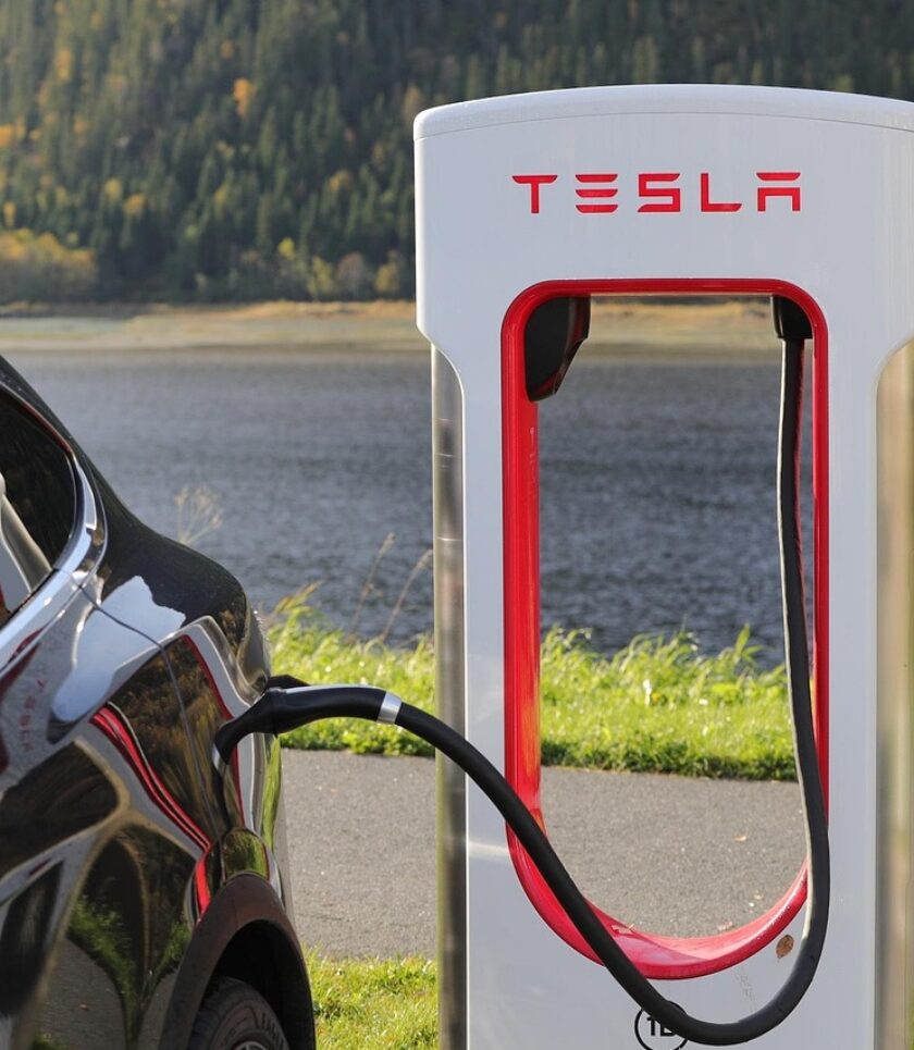 tesla car charging at station
