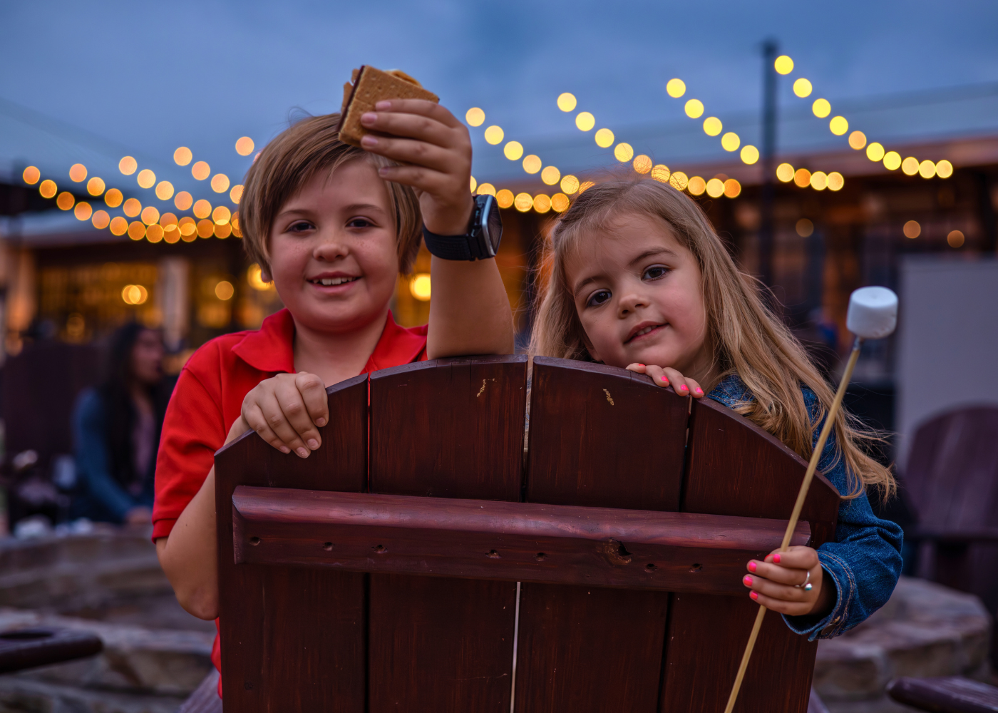 Kids with S'Mores by the Firepit
