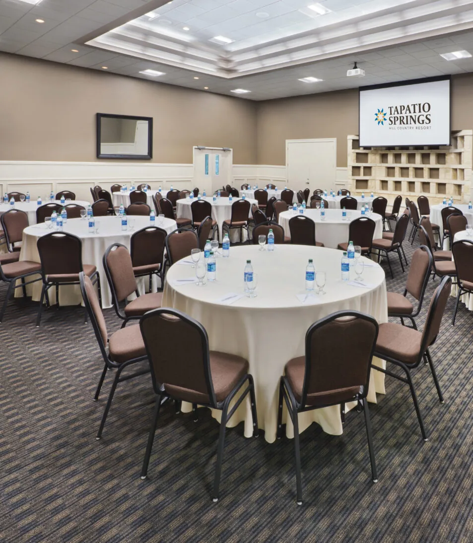 banquet hall with round tables and chairs