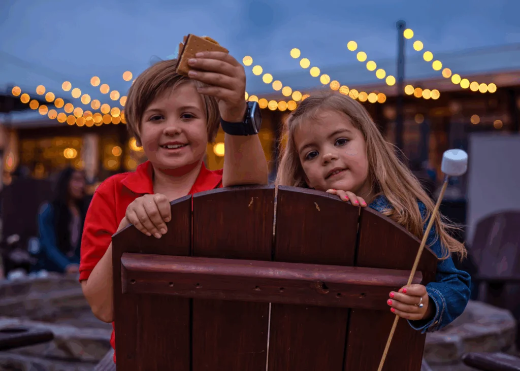 Kids with S'Mores by the Firepit